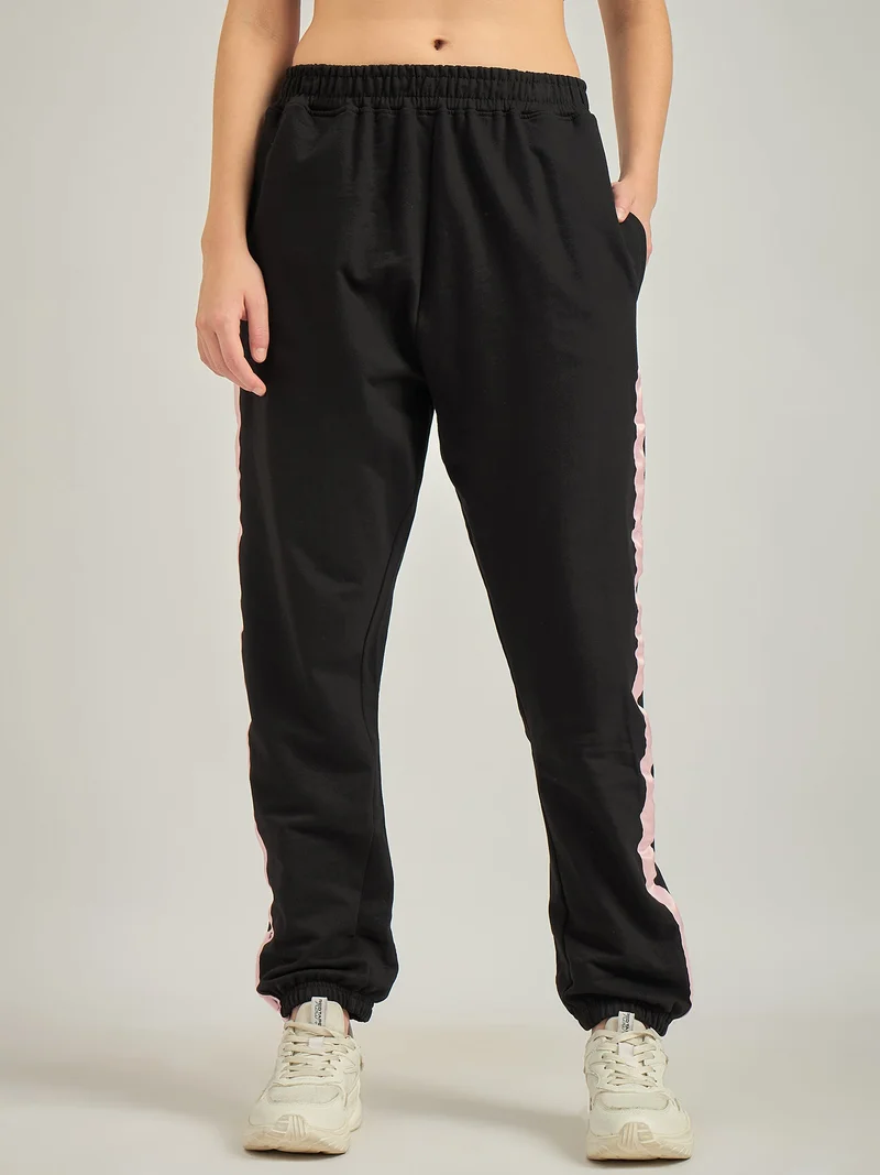 Outzidr  Black Side Tape Printed Sweatpants for Women | Best Price UAE